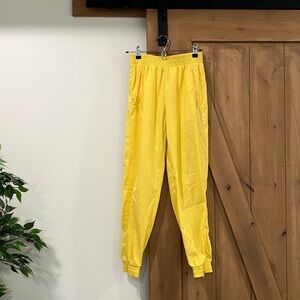 Girlfriend Collective bright sunny yellow summit track pants